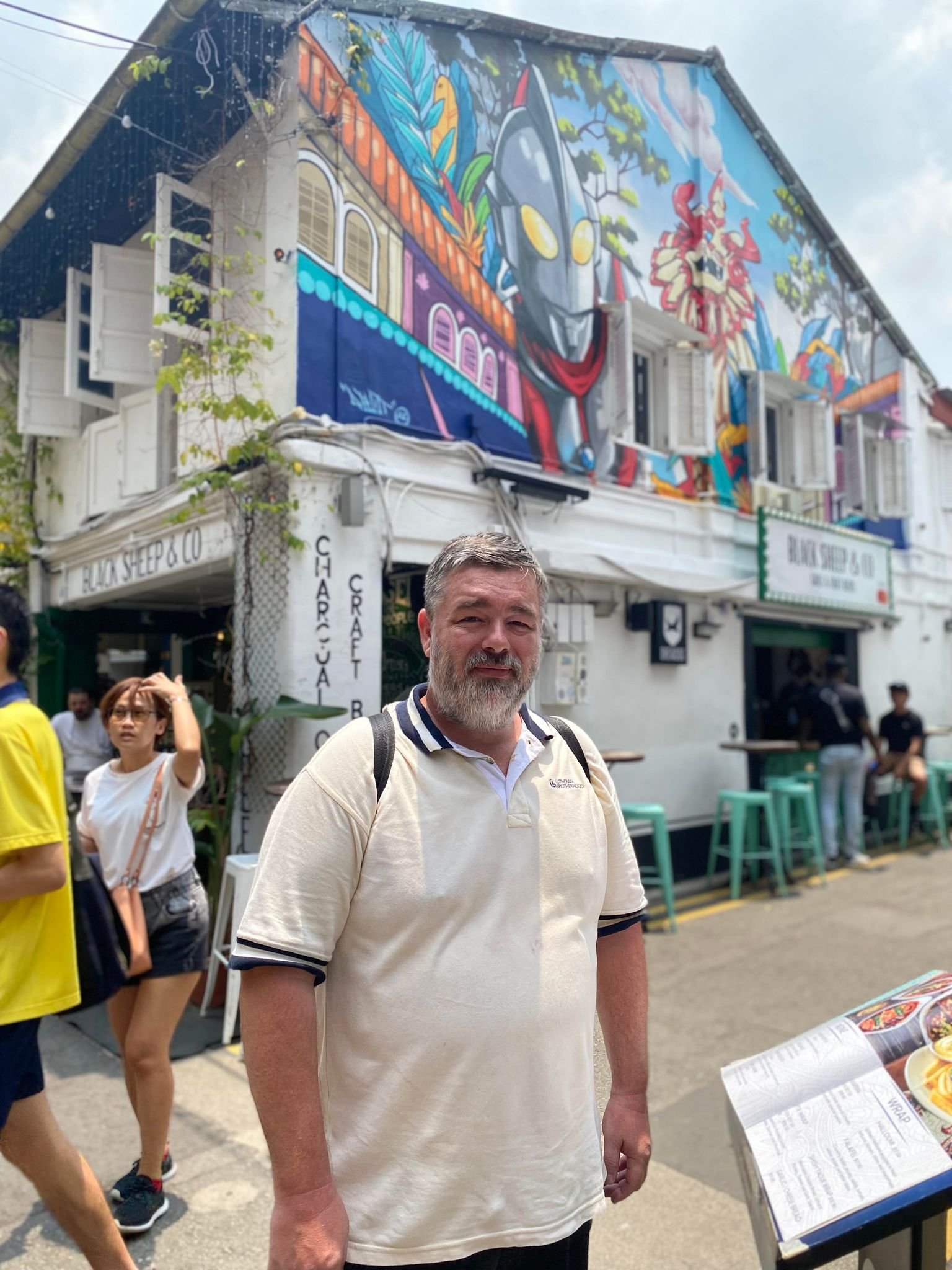 Image of Author: Jason A Ellis traveling the world, local area in Singapore